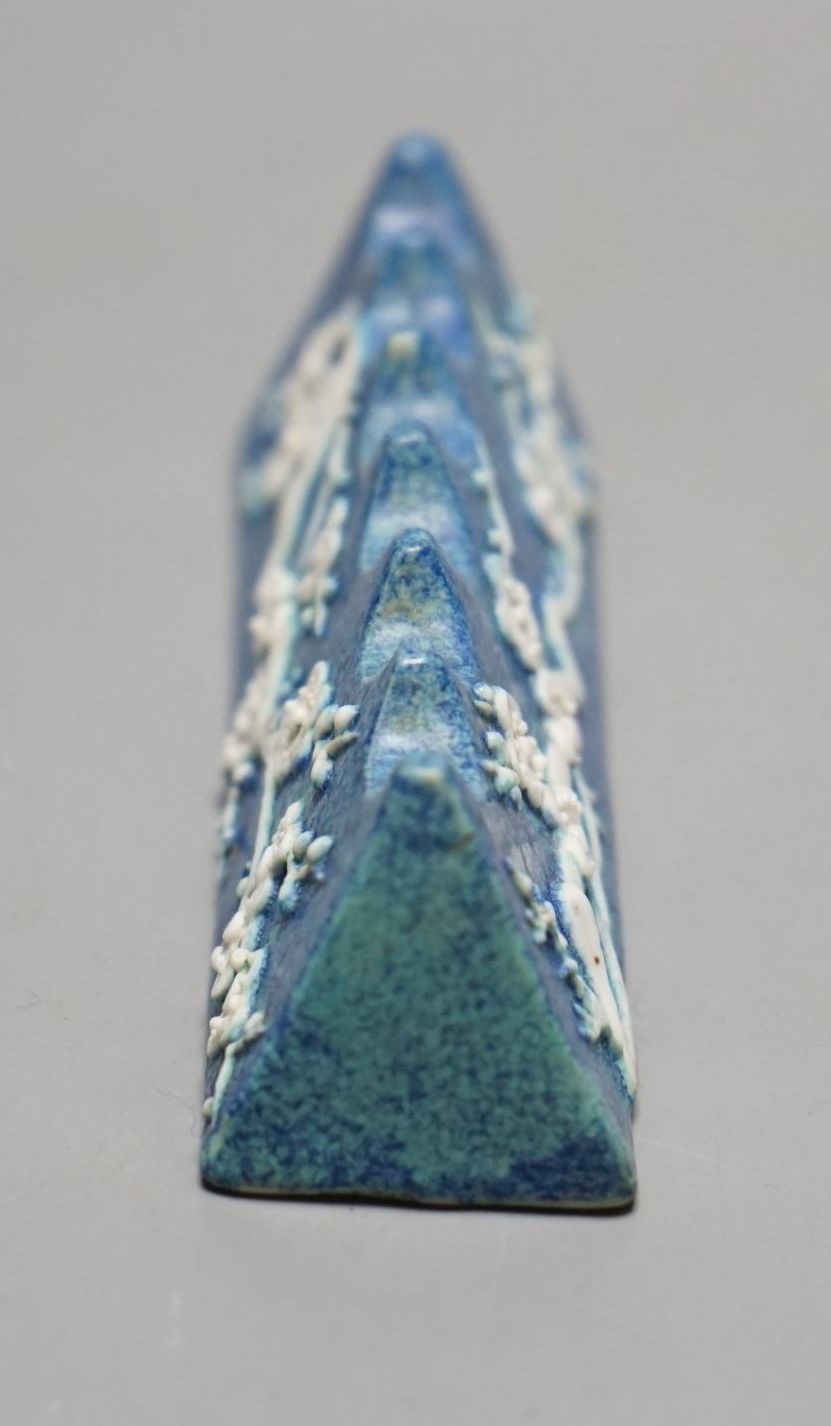 A Chinese robin's egg glazed brush rest, 19th century, 10 cms wide.